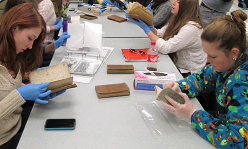 Professional Historians Train Students in Historical Document Handling