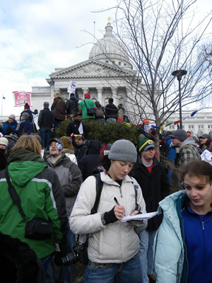 Messitt reported on the Wisconsin Worker protests and recall elections throughout 2011. Her writing and photography were published in the United States and abroad, including on-the-ground-narratives for Mother Jones online and several southern African daily publications.