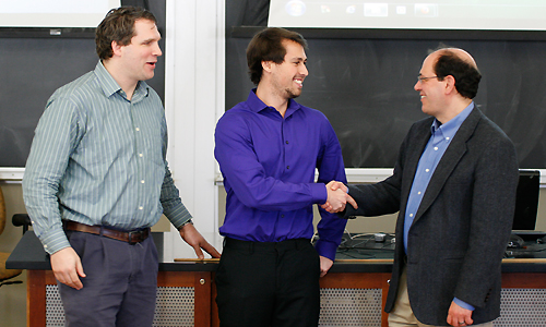 Senior Austin Way (center) receives 'Best Presentation' award from Drs. David Tees and Justin Franz