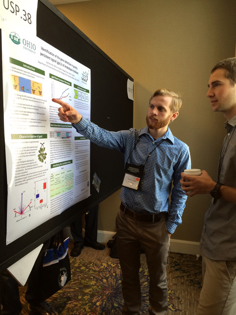 Zachary Hall presents his poster at the American Society for Gravitational and Space Research.