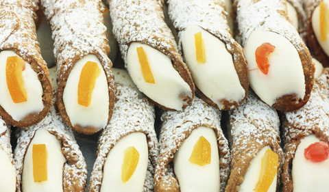 Cannolo siciliano, typical sicilian sweet that is waffle pastry filled with ricotta-cream. 