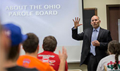 Marc Houk, a member of the Ohio Department of Rehabilitation and Correction Parole Board, speaks to a sociology class about a career in criminal justice.

Photographer: Katelyn Vancouver/Ohio University
