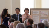 (From left) Tamao Tanaka, Tim Tanaka and Norico Tanaka-Wada are presented a plaque in honor of their parents, Sumiko and Tomoyasu Tanaka. Their plaque – one of which was presented to the family and another that will be displayed in Tanaka Hall – included a watercolor painting of cherry blossoms that was created by Ohio University Executive Vice President and Provost Pam Benoit. Norico Tanaka-Wada noted that the family requested that their plaque highlight their parents’ contribution to the OHIO-Chubu University relationship as reflected through the cherry blossom. “The wonderful thing about the cherry blossoms is that their beauty is fleeting,” said Norico Tanaka-Wada. “So only one week of the whole year is their beauty able to be appreciated, but now we have these beautiful pictures of the cherry blossoms that students can enjoy all year long.” Photo by Jasmine Beaubien