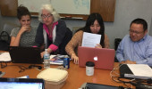 Dr. Coen (on right, second from the left) works with students on computer coding for agent-based model.