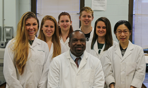 Dr. Jules Guei and Forensic Chemistry students.