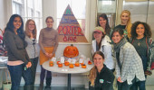 The BEEP Lab team poses with their pumpkin display entry, "A Balanced Porter Diet."