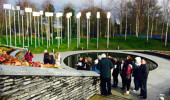 Students visit the Omagh bombing memorial site with Michael Gallagher, chairperson of the Omagh Self Help and Support Group. Gallagher advocates nationally and internationally for a public inquiry into the bombing.