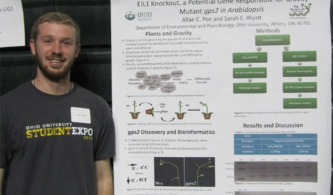 Plant Biology Undergraduate student Allan Poe presents his poster at the Expo.