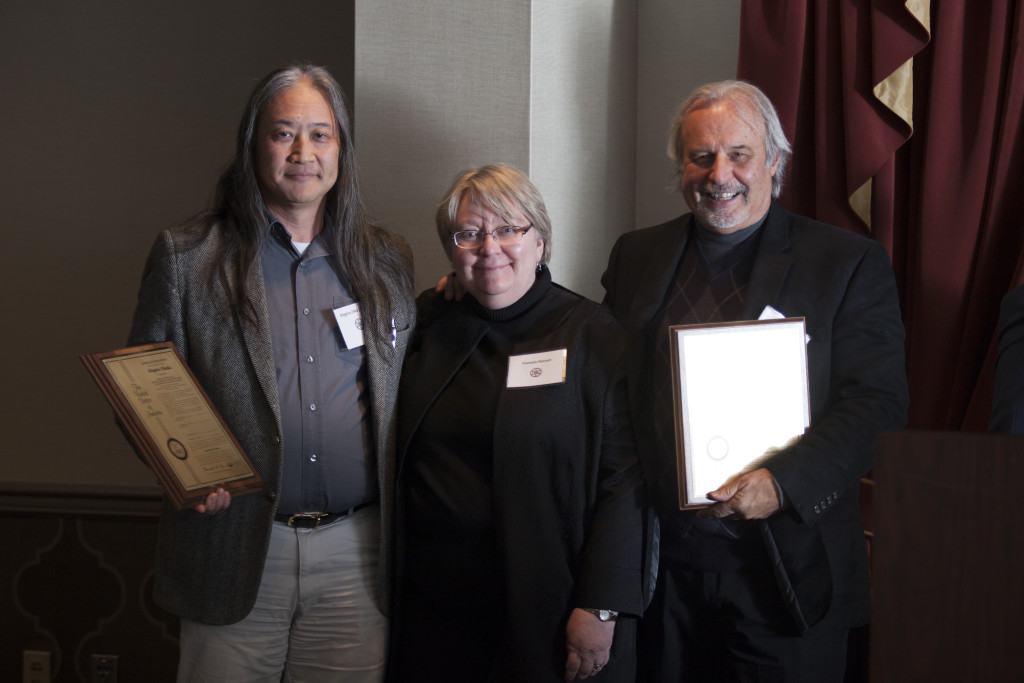 Ohio University Executive Vice President and Provost Pamela Benoit, center, with inventors Shigeru Okada, left, and John Kopchick, right. Photo: Kaitlin Owens.