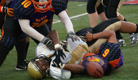 Tackle during women's football the Cincinnati Sizzle versus the Pittsburgh Force in 2012.
