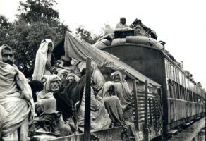 Image of displaced people aboard train