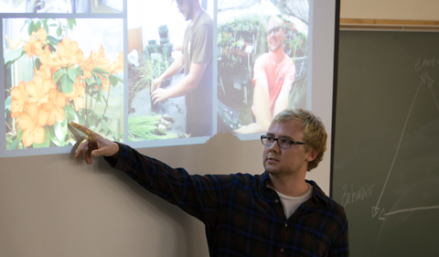 Evan Apt ’15 displays pictures from his internship at the Fairchild Tropical Botanical Garden in Florida.