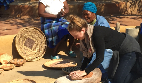 Students visit the cultural village and learn about traditional practices for food in Botswana.