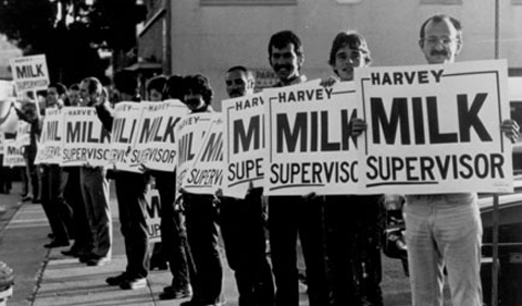 Photo from the film The Times of Harvey Milk, showing protestors holding signs saying Harvey Milk Supervisor