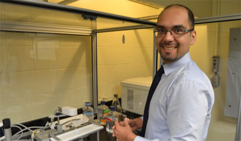 Amir Farnoud in his laboratory in Stocker Center.