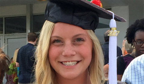 Paige Coy will begin graduate studies at OHIO this fall, shown here in graduation cap and gown.