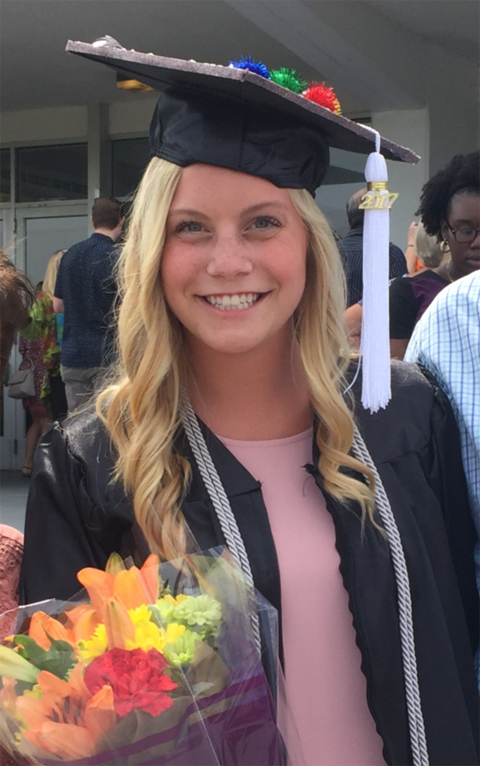 Paige Coy will begin graduate studies at OHIO this fall, shown here in graduation cap and gown.