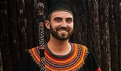 Sean Potts in March 2016 in traditional Kenyan dress at the Guzang Queen Mother's funeral. 