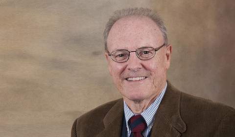 A smiling Dr. Charles Jarrett