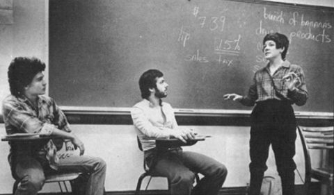 An OPIE class in the 1970a, black and white photo with teacher and three students.