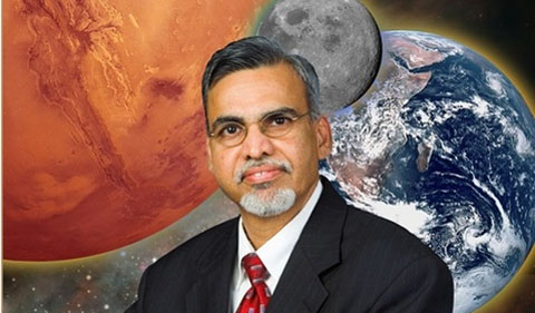 Dr. Kamlesh Lulla, shown with background of earth, mppm amd sun