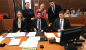 Prosecution team members seated L-R Taryn Osborne, Noah Allen, Elliott Smith, standing L-R Hazel Minich, Katie Belle Neuman, and Austen Burns