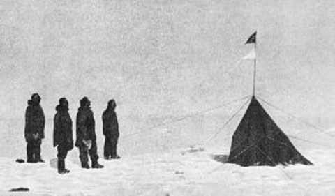 Roald Amundsen’s crew at the South Pole. From left to right: Roald Amundsen, Helmer Hanssen, Sverre Hassel and Oscar Wisting. New research shows warm weather and good conditions were a boon to Amundsen’s crew during their race to the South Pole but hindered the progress of Robert Falcon Scott’s crew across the Ross Ice Shelf. Credit: Roald Amundsen; public domain.