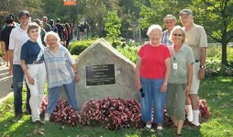Susan Calhoun poses with a group of emeriti volunteers as they work on the plantings at Emeriti Park on the Athens Campus. Photo courtesy of: Susan Calhoun