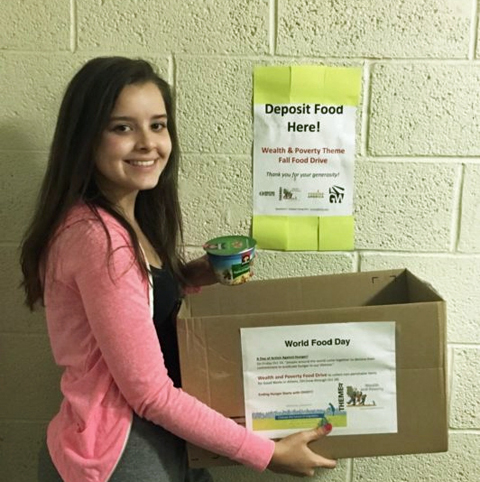 Lauren Conner with her food drive box