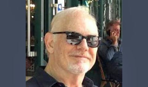 Dr. Gary Holcomb, wearing sunglasses