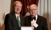 President M. Duane Nellis awards Tadeusz Malinski with a U.S. patent plaque. Photo credit: Evan Leonard.