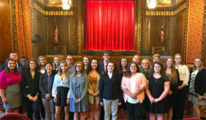 Summer Law & Trial Institute students at the Supreme Court of Ohio, standing in front of the justice's bench.
