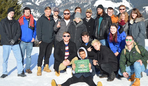 2019 Program – Maria Alm, Austria, group shot with snowy mountains in background