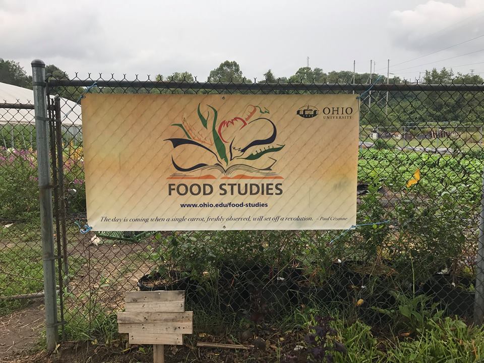 The Food Studies banner hangs on the fence at the OHIO Student Farm.