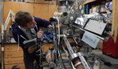 Physics doctoral student Michael Mroz uses a low-energy electron microscope to examine the physical properties of compounds that make up thermionic cathodes.