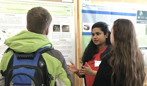 Proma Basu with her poster at ASPB Midwest regional 