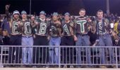Michael Richards with his Bobcat letter friends at a football game.
