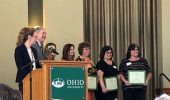 Kara Dunfee, far right, is recognized for 30 years of service.