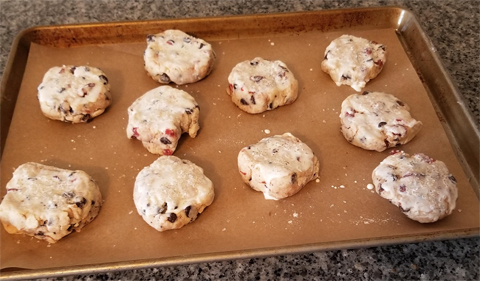 Scones ready for the oven on a baking pan
