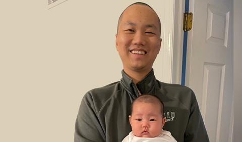 Xianlong Zeng with his new baby.