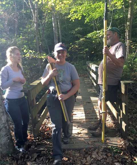 Sarah Maracz (far left) talks to John Knouse (right) on National Public Lands Day in 2017. Sarah is now the president of the Plant Club and participated in the workday on the trail. Photo by Dr. Thompson