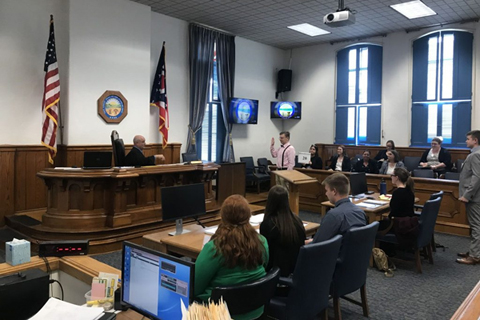 The Summer Law & Trial Institute holds a mock trial in an Athens courtroom in 2019.