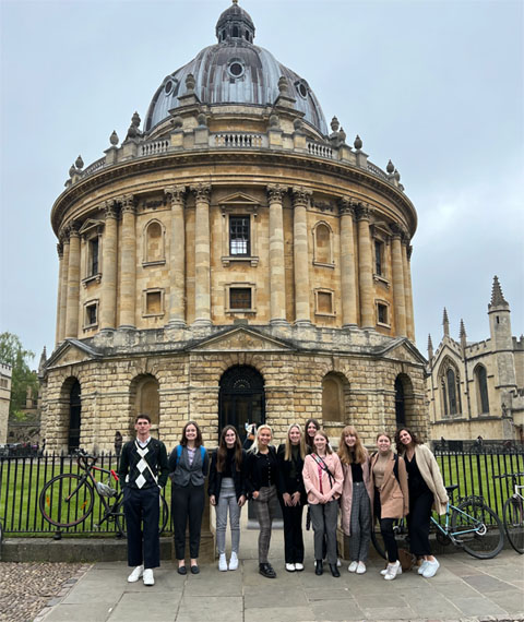 Menard Family George Washington Forum fellows in front of the Radcliffe Camera in Oxford, U.K. 