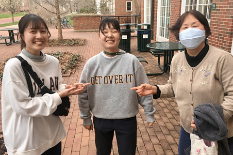 From left, Chubu students Mayu Kishita and Sakura Shiozaki Learn to Get Over It with sensei Joung Hee Krzic 